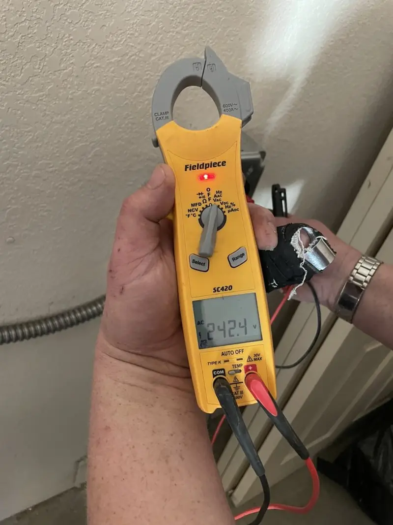 Voltage testing with clamp meter during Generator Installation in Sewickley